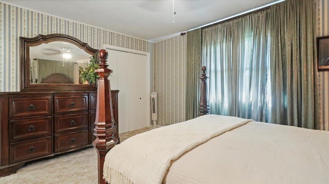 1931 Kay Dr, West Plains, MO 65775 - bedroom featuring light carpet, wallpapered walls, and ceiling fan