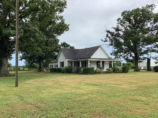 1231 W Main St, Fordland, MO 65652 - view of front of property featuring a porch and a front yard