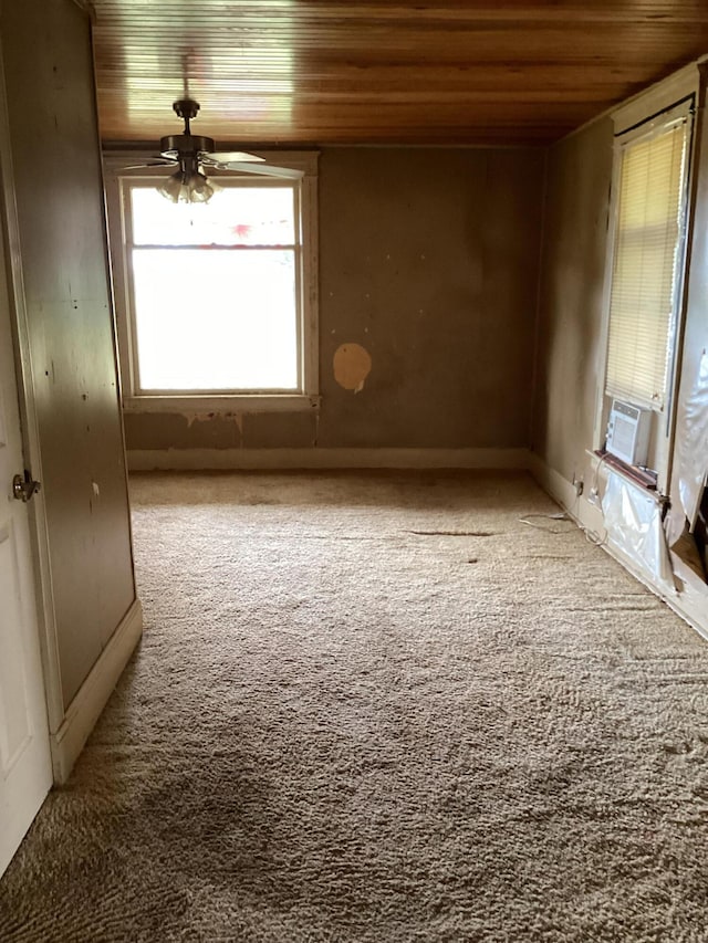 1231 W Main St, Fordland, MO 65652 - carpeted empty room with wood ceiling, ceiling fan, and cooling unit