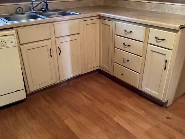 1231 W Main St, Fordland, MO 65652 - kitchen featuring dishwasher, wood finished floors, and light countertops