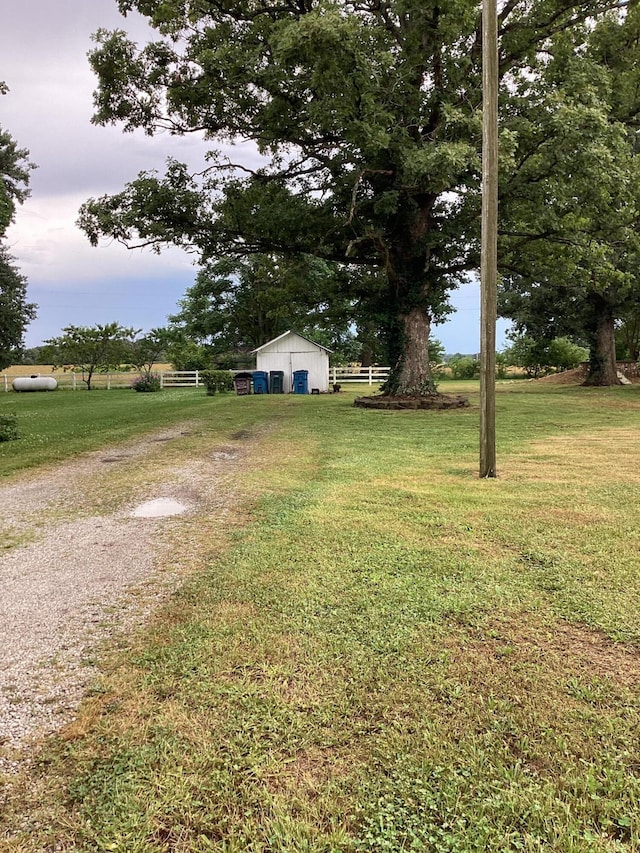 1231 W Main St, Fordland, MO 65652 - view of grassy yard featuring an outbuilding and a pole building