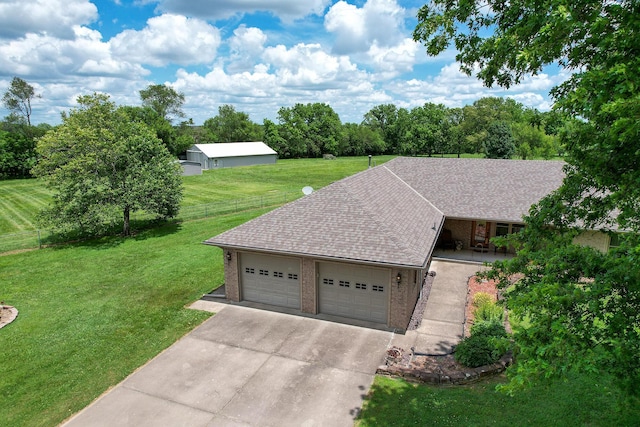 615 W Mchenry Ave, Billings, MO 65610 - single story home with concrete driveway, an attached garage, brick siding, and a shingled roof