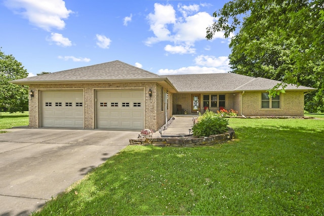 615 W Mchenry Ave, Billings, MO 65610 - ranch-style home with concrete driveway, an attached garage, brick siding, and a front yard