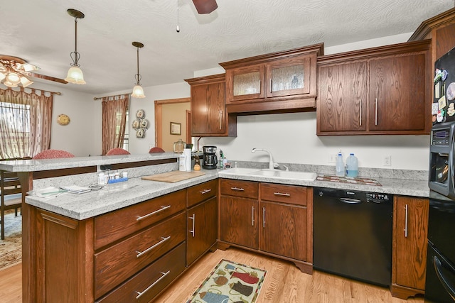 615 W Mchenry Ave, Billings, MO 65610 - kitchen featuring dishwasher, ceiling fan, a peninsula, and light wood finished floors