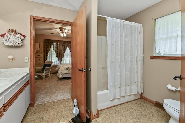 615 W Mchenry Ave, Billings, MO 65610 - ensuite bathroom featuring vanity, a ceiling fan, shower / bath combo with shower curtain, and tile patterned floors