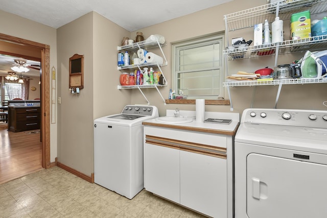 615 W Mchenry Ave, Billings, MO 65610 - laundry area featuring separate washer and dryer, light floors, and cabinet space