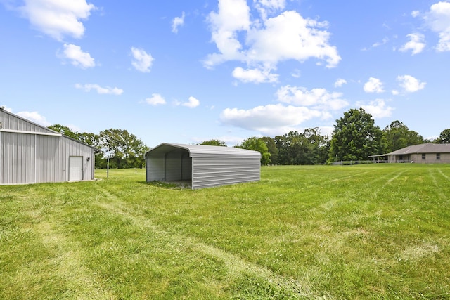 615 W Mchenry Ave, Billings, MO 65610 - view of green lawn with a carport