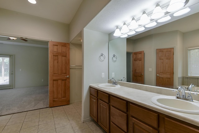 613 Crossing Dr, Branson West, MO 65737 - bathroom with double vanity, tile patterned flooring, and a ceiling fan