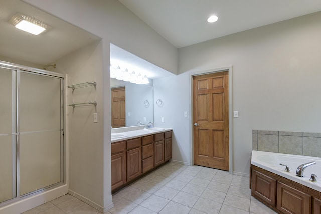 613 Crossing Dr, Branson West, MO 65737 - full bathroom with tile patterned floors, a shower stall, double vanity, and a garden tub