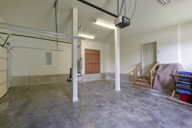 613 Crossing Dr, Branson West, MO 65737 - garage with a garage door opener and electric panel