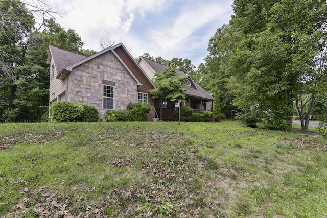 613 Crossing Dr, Branson West, MO 65737 - view of front facade with stone siding
