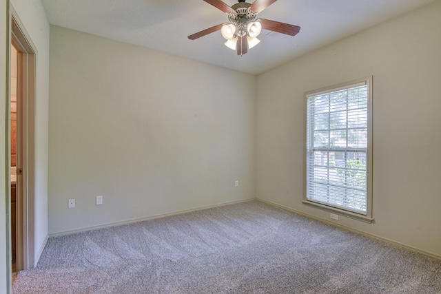 613 Crossing Dr, Branson West, MO 65737 - carpeted spare room featuring a ceiling fan and baseboards