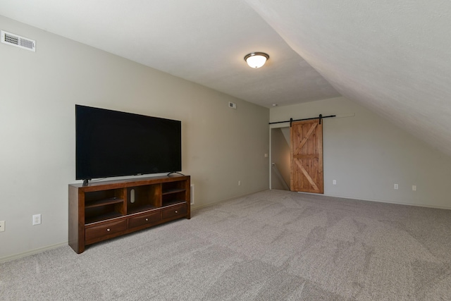 613 Crossing Dr, Branson West, MO 65737 - additional living space featuring a barn door, lofted ceiling, and carpet