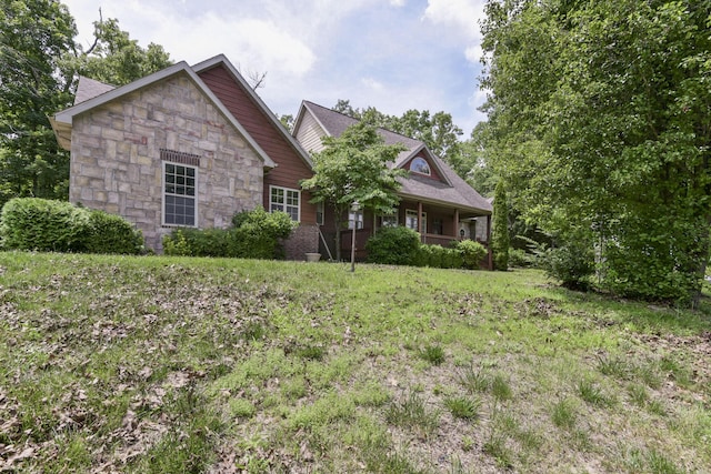 613 Crossing Dr, Branson West, MO 65737 - craftsman inspired home featuring stone siding and covered porch