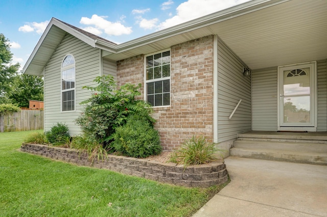 409 Ace Ct, Nixa, MO 65714 - doorway to property with brick siding