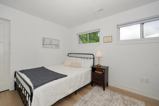 1373 E River Oak Dr, Springfield, MO 65803 - bedroom featuring wood finished floors