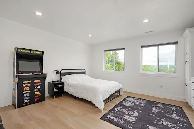1373 E River Oak Dr, Springfield, MO 65803 - bedroom with light wood-type flooring and recessed lighting