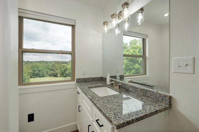 1373 E River Oak Dr, Springfield, MO 65803 - bathroom with vanity and baseboards