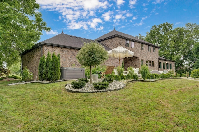 1373 E River Oak Dr, Springfield, MO 65803 - view of front of home featuring brick siding and a front lawn