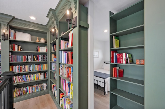1373 E River Oak Dr, Springfield, MO 65803 - interior space with wood finished floors, recessed lighting, and wall of books