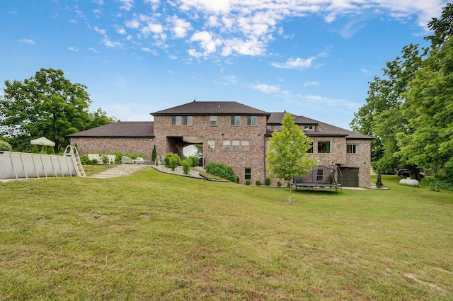 1373 E River Oak Dr, Springfield, MO 65803 - rear view of house with a lawn and brick siding