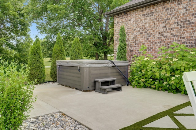 1373 E River Oak Dr, Springfield, MO 65803 - view of patio / terrace with a hot tub