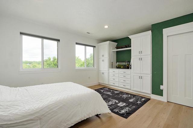 1373 E River Oak Dr, Springfield, MO 65803 - bedroom with light wood-style flooring and recessed lighting