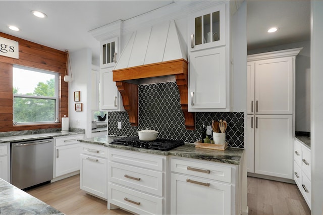 1373 E River Oak Dr, Springfield, MO 65803 - kitchen with stainless steel dishwasher, black gas stovetop, custom exhaust hood, backsplash, and light wood-style flooring
