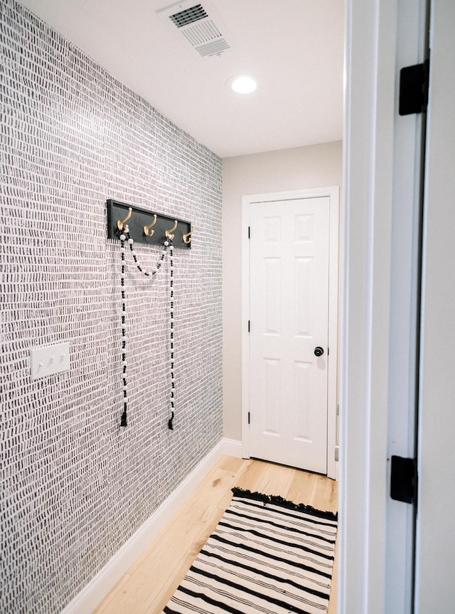 158 Troon Dr Unit 5, Branson, MO 65616 - entryway with light wood-type flooring, recessed lighting, and an accent wall