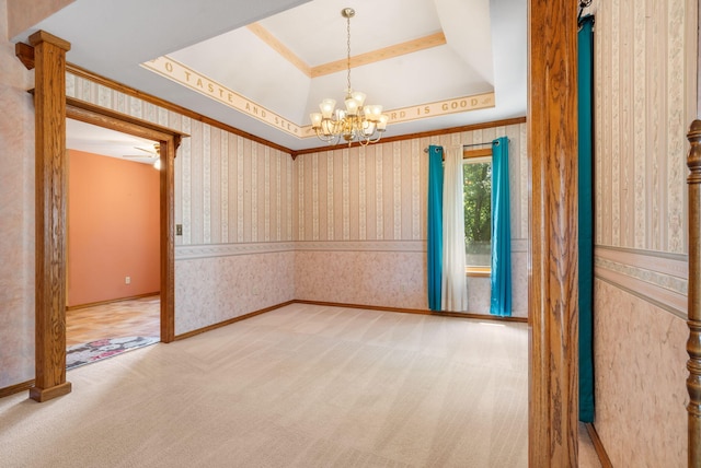 401 N Niangua Dr, Nixa, MO 65714 - spare room featuring wallpapered walls, a raised ceiling, carpet flooring, crown molding, and a chandelier
