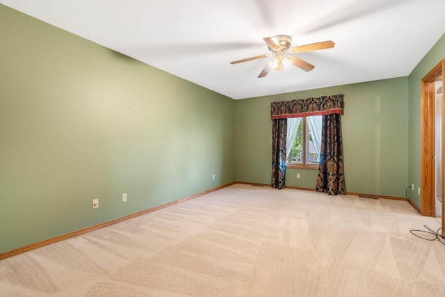 401 N Niangua Dr, Nixa, MO 65714 - empty room featuring a ceiling fan and light carpet