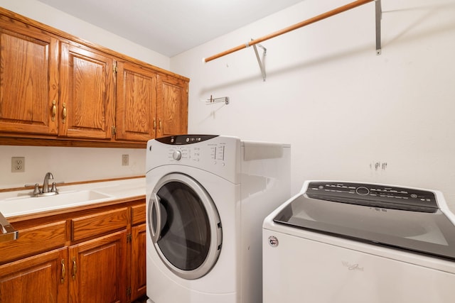 401 N Niangua Dr, Nixa, MO 65714 - laundry room featuring cabinet space and washing machine and dryer