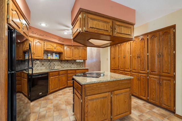 401 N Niangua Dr, Nixa, MO 65714 - kitchen featuring black appliances, brown cabinets, backsplash, recessed lighting, and a kitchen island