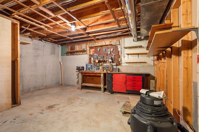 401 N Niangua Dr, Nixa, MO 65714 - unfinished basement featuring a workshop area