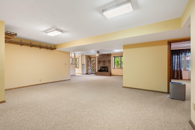 401 N Niangua Dr, Nixa, MO 65714 - unfurnished living room featuring light colored carpet and a brick fireplace