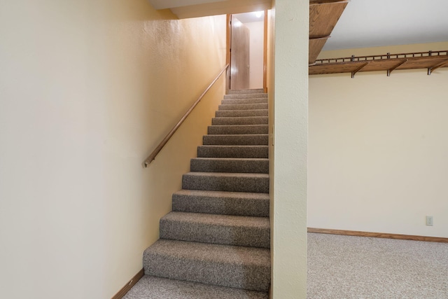 401 N Niangua Dr, Nixa, MO 65714 - staircase with carpet floors and baseboards