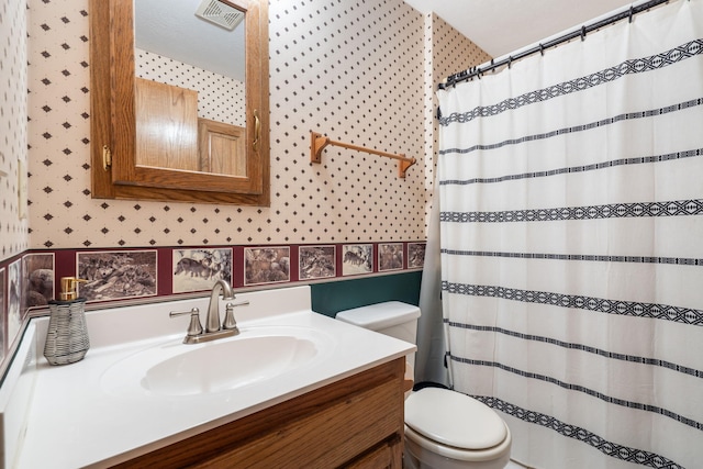 401 N Niangua Dr, Nixa, MO 65714 - bathroom featuring vanity, wallpapered walls, and curtained shower