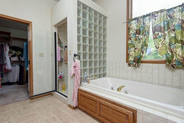 637 State Highway Kk, Cedar Creek, MO 65627 - full bath with a bath, a spacious closet, and a stall shower