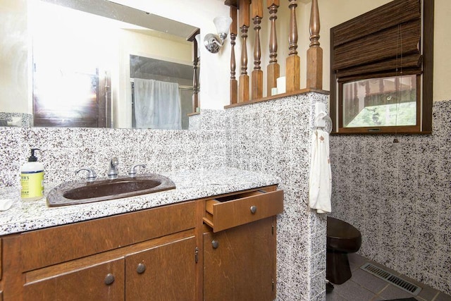 637 State Highway Kk, Cedar Creek, MO 65627 - bathroom with vanity, tile walls, tile patterned flooring, and tasteful backsplash