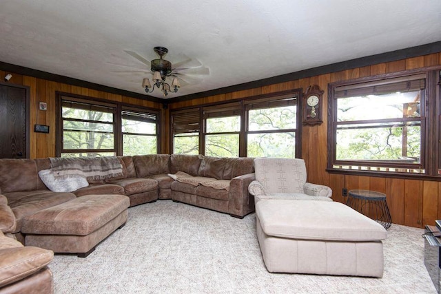 637 State Highway Kk, Cedar Creek, MO 65627 - carpeted living area with wood walls, plenty of natural light, and ceiling fan