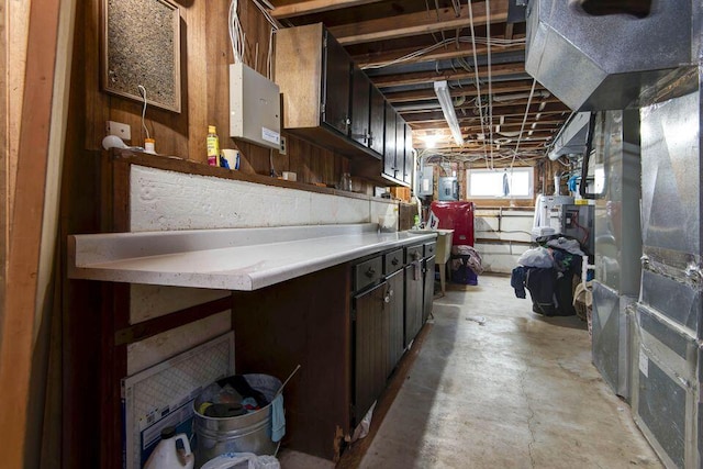 637 State Highway Kk, Cedar Creek, MO 65627 - kitchen featuring concrete flooring, light countertops, and dark brown cabinetry