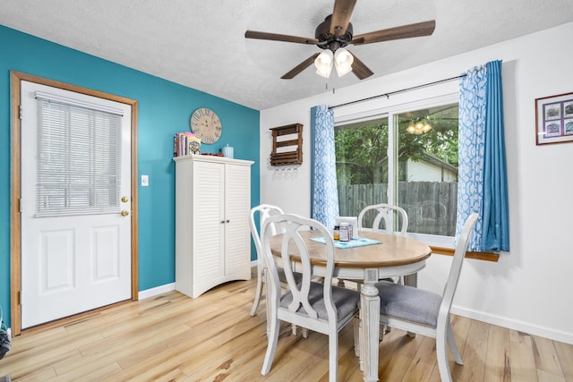 4105 S Oak Ave, Springfield, MO 65804 - dining area with a ceiling fan, a textured ceiling, and light wood-style floors