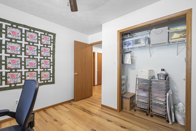 4105 S Oak Ave, Springfield, MO 65804 - office area with wood finished floors, a ceiling fan, and a textured ceiling