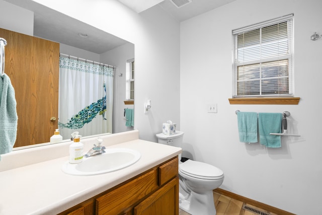 4105 S Oak Ave, Springfield, MO 65804 - full bath with vanity, wood finished floors, and curtained shower