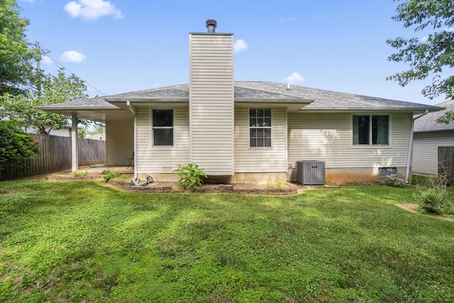 4105 S Oak Ave, Springfield, MO 65804 - rear view of house featuring a chimney