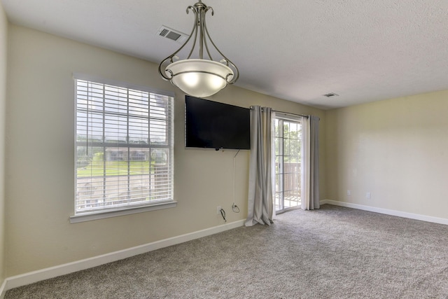12 Scenic Ct Unit 10, Branson, MO 65616 - carpeted empty room featuring baseboards and a textured ceiling