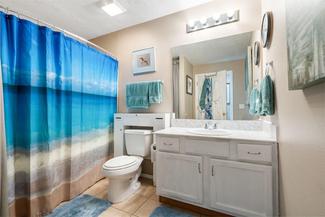 128 Knowledge Ave Unit 2, Branson, MO 65616 - bathroom with vanity, tile patterned flooring, and a textured ceiling