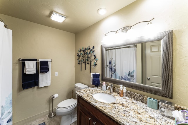 182 Regent Dr, Branson, MO 65616 - full bath featuring vanity, tile patterned flooring, a textured wall, and a shower with curtain