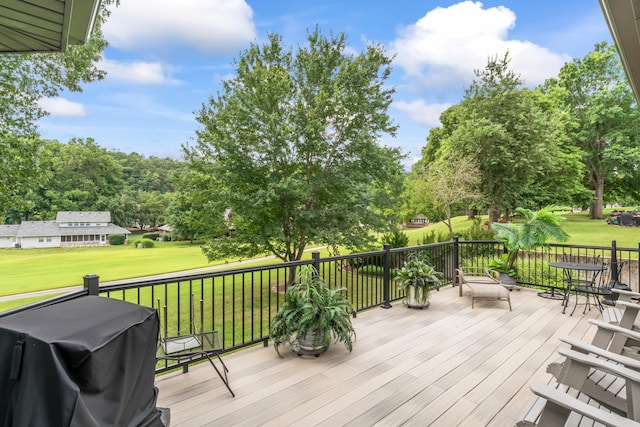 182 Regent Dr, Branson, MO 65616 - wooden terrace featuring a grill and a lawn