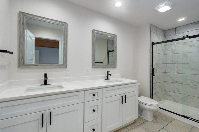 753 S Elm Rd, Marshfield, MO 65706 - bathroom featuring a stall shower, double vanity, and recessed lighting